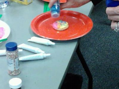 Making the play therapy cookie with sprinkles