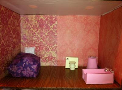 The pink room play therapy doll house