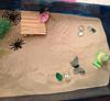 2nd photo of building a bridge in sand tray therapy class.